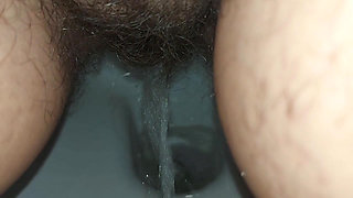 the longest trip to the bathroom, a very long piss, a hairy pussy peeing