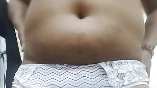 Indian girl fingering her pussy and squeezing her boobs in her bedroom