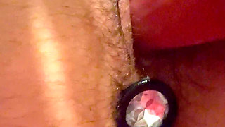 I dildo my pussy with a plug in my ass