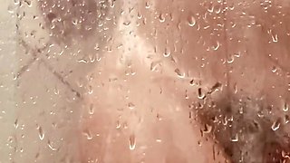 MILF Filming Herself Washing Her Hairy Pussy in the Bathroom