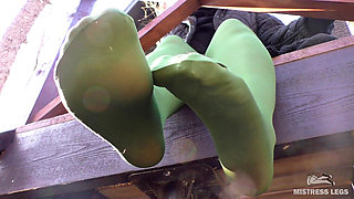 Goddess in Green Pantyhose Teases with Her Feet on the Porch