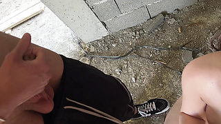 Two Russian guys fucked a cute slut in an abandoned building and came on her face