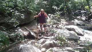 My friend naked at the waterfall