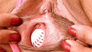 Amateur Latin with Mini Skirt Plays a Baseball in Her Big Pussy