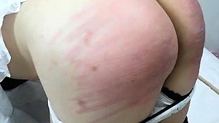Amateur girl bends over and gets her lovely ass spanked hard