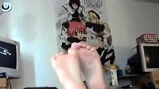 Goth emo girl licks her own feet