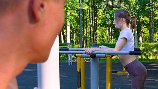 Outdoor sex with a hot milf and a young athlete in the woods.