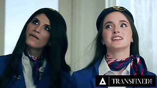 Lovely Busty Teen Stewardess Enjoys Gonzo Sex With Her Charming Brunette Shemale Colleague