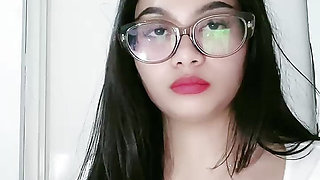 Woman wearing cleavage glasses