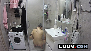 LUUV. Tattooed Alice gets ready for the evening reality show segment in the shower