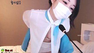 Horny korean model in uniform shows her body