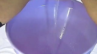 I Pee Into a Bottle Through a Funnel