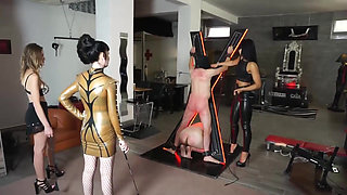 Three femdom chicks whipping and punishing their slaves