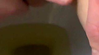 She pees in the toilet beautiful beautiful golden shower on toilet
