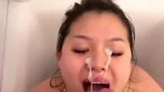 Beautiful Asian girl gives blowjob in the shower