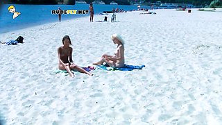 Ravishing nude beach girls tanning