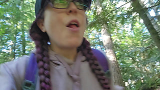 Hiker Pees on a Log