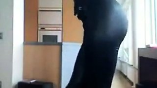 Smoking Hot Brunette Milf in Latex Catsuit and Boots