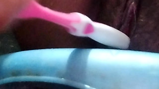 Horny women fuck her pussy using toothbrush deep inside while bathing caught