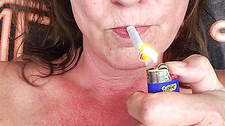 POV dildo blow job and squirting outside while smoking a cigarette