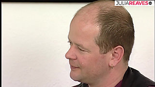 Blonde hottie sucks a huge dildo then rides it on the bed