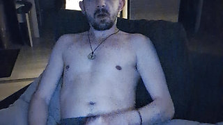 Gay man jerks off his cock and smokes a cigarette