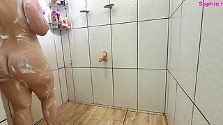 Very naughty stepmom takes a shower with the door open and rolls naked with her thick cock!