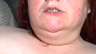 Redhead BBW gets her pussy fisted and sucks cock