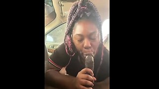 Amateur ebony MILF sucks off big black cock in the car