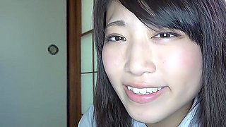 While using a vibrator, she inserts and removes a dildo and gives a blowjob, taking the penis in her mouth.