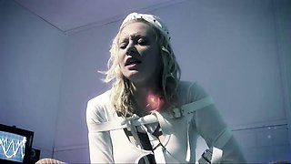 Busty blondie in a straightjacket has hot threesome with two doctors
