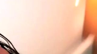Busty babe playing with her big boobs