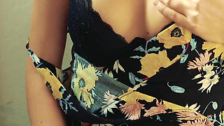 Pretty woman masturbates on camera in a dress and brings herself to a loud orgasm with her fingers.