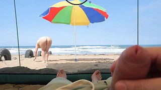 matured tourists have extreme outdoor handsjob on the beach.