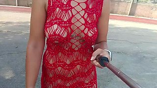 Polish girl flashes huge natural tits and pussy in lace dress outdoor public