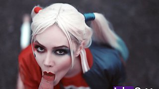 Superman inserts Harley Quinn's bat into his anus