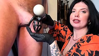 Merciless mistress brings caged cock to the edge of orgasm