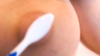Teasing Big Milky Tities with Toothbrushes