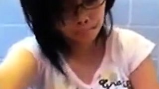 Amateur Asian Girl in Glasses Masturbating