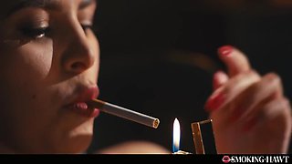 Hot Brunette With Red Lipstick Nails And Sexy Lingerie Touching Herself While Smoking Cigarette