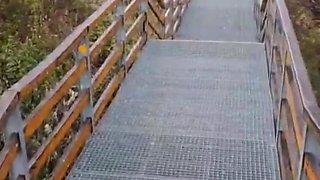 Slutty redhead gives a nice blowjob to an older guy outdoor and takes his cum in her mouth