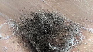 A hairy pussy, beautiful tits and a mouth full of cum