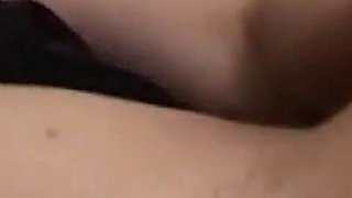 Brunette plays with dildo