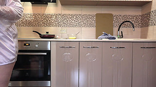 A Mature Wife Prepares Breakfast, and the Home Camera Watches. Big Ass in White Panties Under a Short Robe