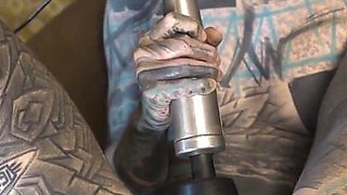Tattooed Woman Testing Fuck Machine with Her Anal