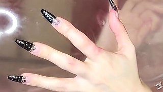 Big-lipped Bimbo Inflates a Condom and Plays with It.