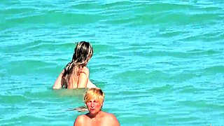 Shameless amateur fisted on a public beach