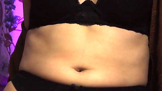 Slender milf caresses herself on camera