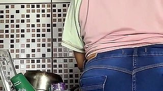 Curvy Girl Farting in Jeans While Doing the Dishes
