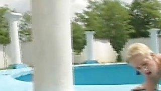 Blonde with short hair gets her pussy screwed outside in a empty pool